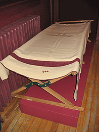 Lieutenant Principe's cot and a 1944 U.S. Army Medical Corps blanket