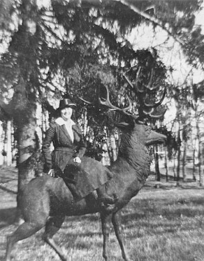 Burleigh Park, undated photo, unidentified lady on iron stag