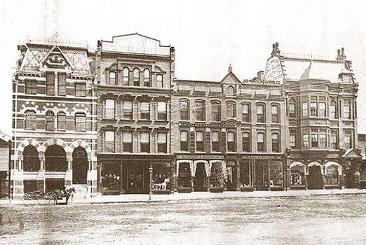 circa 1885, store building at far right