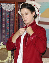 Jane demonstrating a full blouse known as a waist back in the 1860s.