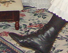 A sample of high topped shoes which were normally worn by women for daytime footwear.