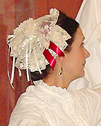 A lace day cap  was proper indoor head gear worn by married women and stayed on for the entire day.