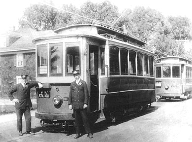 Two older 4-wheel cars near Bull's Head, 1918