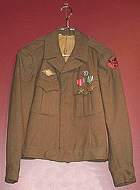 Eisenhower Jacket with Medical Combat Badge, Bronze Star Medal, European Theatre Medal with one combat star worn by George Reiss