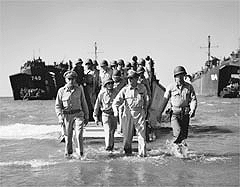 General MacArthur wades ashore in the 24th Infantry Division
