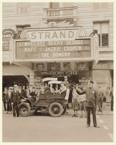 Strand Theatre c. 1933. Movie promotion of 'The Bowery'. Police officer John McInerney directing traffic.