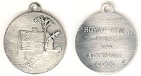 pewter pendant depicting the Hoyt Barnum House