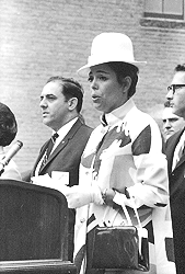 Mrs. Eugene Johnson sings the National Anthem