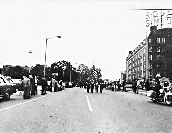 Marching down Washingotn Boulevard, at right the old Roger Smith Hotel, just south of the Broad Street intersection